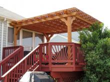 traditional style wood pergola on deck with lattice roof